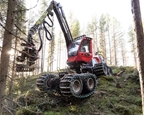 New Komatsu Wheeled Harvester working in forest